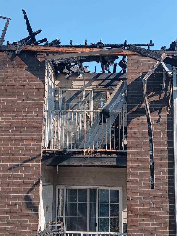 Burned-out balcony and unit at a multi-family fire loss
